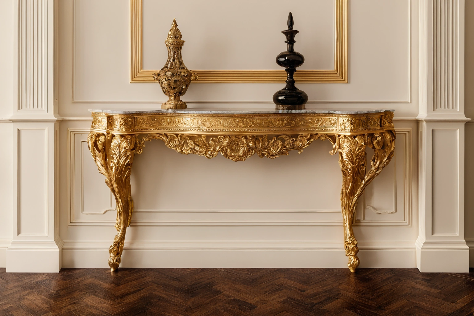 Gilded classic console table with carved details against a cream wall